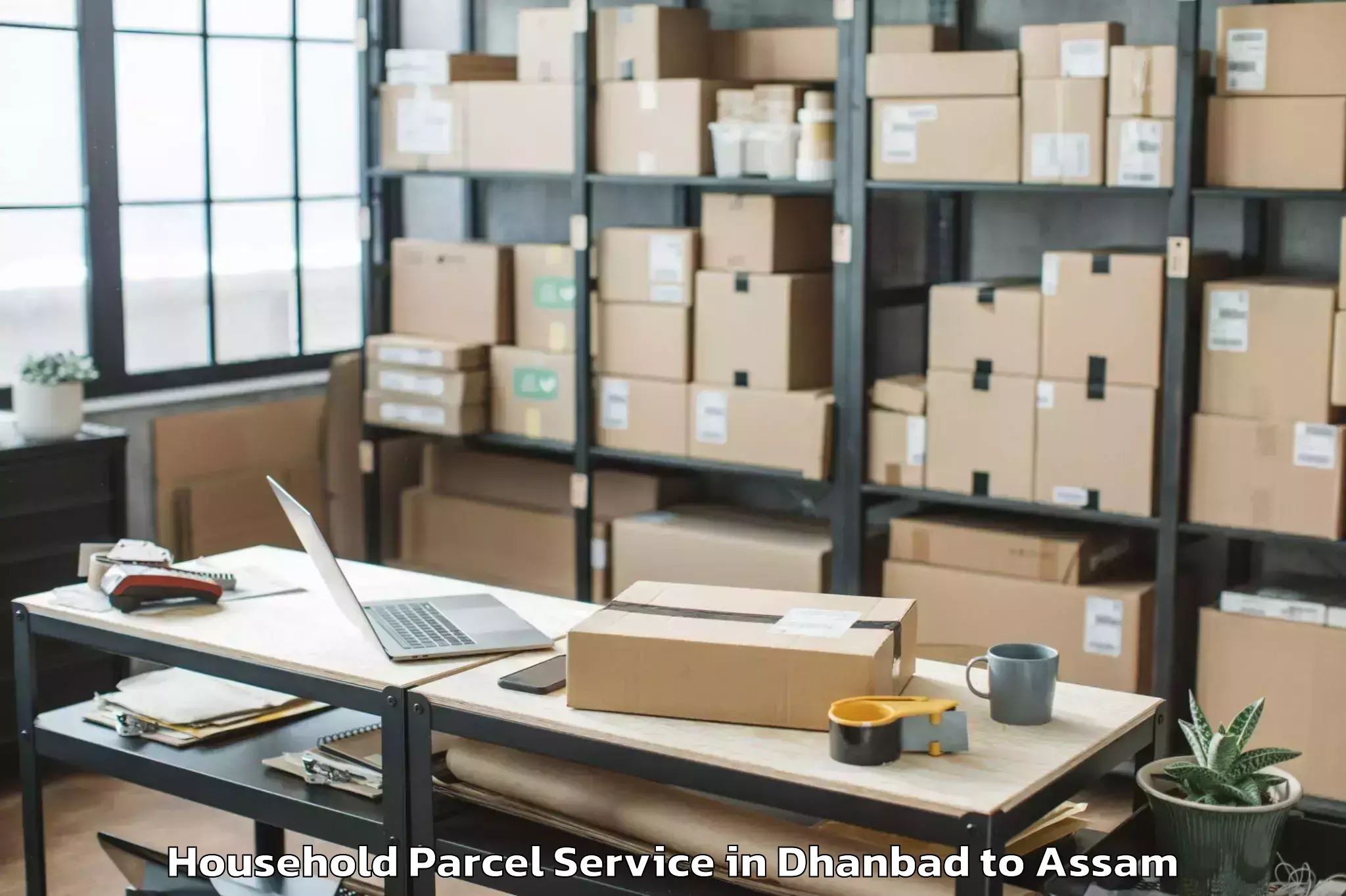 Book Your Dhanbad to Lilabari Airport Ixi Household Parcel Today